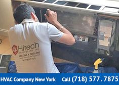 a man working on an appliance in a kitchen with the words hvac company new york