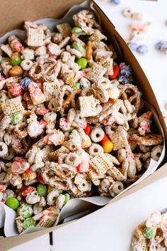 a box filled with cereal and candy mix