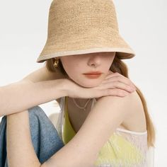 Discover Stylish Sun Protection Embrace the sunshine with elegance and comfort using our Summer Beach Straw Bucket Hat. Perfect for those sunny days, whether you're lounging at the beach or exploring the outdoors, this hat combines fashion with functionality. Its dome-shaped top and wide brim not only offer a chic silhouette but also provide substantial sun protection, keeping you cool and shielded. Key Features Crafted from high-quality straw, this hat is designed for durability and comfort. It Lightweight Panama Hat For Sunbathing, Lightweight Straw Hat For Summer Sunbathing, Lightweight Summer Straw Hat For Sunbathing, Lightweight Straw Hat For Sunbathing In Summer, Lightweight Bucket Hat With Curved Brim For Sunbathing, Summer Coastal Hats For Travel, Lightweight Coastal Sun Hat For Summer, Spring Bucket Hat With Uv Protection In Natural Color, Travel Sun Hats For Beach Season