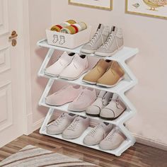 there are many pairs of shoes on the shelf