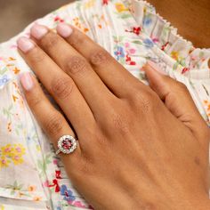 The Story A timeless cluster ring with a striking stone at center. Sitting at the center of this piece is a richly colored spinel weighing approximately 1.17 carats. The vintage cut stone is saturated in a red hue. Prong set, it's surrounded by a halo of 13 chunky Old Mine cut diamonds, weighing 0.04 to 0.05 carats each, giving the ring a total diamond weight of approximately 0.59 carats. The setting, from circa 1905, was beautifully paired with the vintage cut spinel which was added at a later date. The center spinel makes it pop with color. It looks amazing on the hand with its universally flattering shape and size. We love it on its own or paired with other favorite pieces. It would make a fantastic engagement ring for someone looking for a unique and colorful piece. The Specs Style Num Imperial Topaz, Locket Charms, European Cut Diamonds, Platinum Ring, 14k Gold Ring, Diamond Cluster, Antique Rings, Cluster Ring, Pave Diamonds