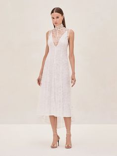 Meet the Rhiane Lace Midi Dress—a blend of elegance and edge that's designed to turn heads. This piece is all about versatility. Wear it with the slip for a more classic, refined look, or without if you're feeling daring. The intricate lace detailing adds a touch of romance, while the sheer fabric keeps things modern a Skirt Jumpsuit, Lace Midi, Lace Midi Dress, Sheer Fabric, Party Looks, Sheer Fabrics, Engagement Party, Jacket Tops, Lace Detail