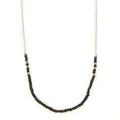 CORIE NECKLACE - GOLD NECKLACES ONLINE | VICTORIA BEKERMAN Elegant Black Crystal Necklace With Beaded Chain, Minimalist Black Beaded Choker Necklace, Black Beaded Necklace With Adjustable Chain As Gift, Minimalist Beaded Jewelry For Party, Black Beaded Chain Necklaces For Party, Elegant Beaded Choker Necklace, Black Dainty Jewelry For Party, Black Jewelry With Beaded Chain And Round Beads, Elegant Beaded Necklaces With Delicate Chain For Party