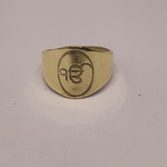 About item Item :-  Sikh onkar ring Ring size :- Chose from variation (Custom size accepted) Material  :- 925 Sterling silver Purity  :- 92.5 Title:- Ek Onkar Ring, handmade gold plated, Punjabi Sikh Khalsa Gurmukhi script, Punjabi Wedding Gifts, Khanda Symbol, Ek Onkar, Sikhism, Sikh Gift Description:- We use 925 sterling silver to making jewelry. We accept all types of custom & personalized order. Please send us a message if you are interested in a custom creation. Shipping profile:- We ship a Gold Rings As Diwali Gifts, Symbolic Round Jewelry For Puja, Gold Rings For Anniversary And Festivals, Traditional Etched Rings For Ceremonial Occasions, Traditional Etched Ceremonial Rings, Symbolic Ceremonial Jewelry For Festivals, Gold Rings Suitable For Festivals Or Gifts, Gold Rings For Festivals, Symbolic Hallmarked Jewelry For Puja