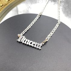 Item: 2023NE0202 Material: Copper Color: Gold Chain Length: 14",16",18",20",22" Process: Gold Plated Recipient: Women, Mom, Wife, Girl Friend, Children Necklace Type: Name Necklace Brand: Silviax Jewelry Silver Pendant Name Necklace, Silver Engraved Name Necklace, Silver Engraved Metal Name Necklace, Silver Metal Chain Necklace As Gift, Silver Metal Chain Necklace For Gift, Dainty Silver Charm Necklaces For Parties, Silver Stainless Steel Name Necklace Pendant, Silver Metal Nameplate Necklace, Elegant Silver Name Necklace For Party