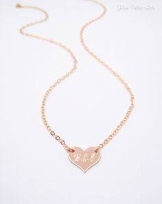 "Small Personalized Heart Necklace - 100% 14k Gold Fill, Rose Gold Fill or Sterling Silver Heart can be personalized with up to three letters or left blank. This is such a dainty and sweet necklace! * We can fit up to 3 letters on this necklace. - Heart is 14k gold fill, 925 sterling or rose gold fill and measures 12mm - Chain is a sturdy yet dainty 14k gold fill, 925 sterling or rose gold fill - Necklace shown at 18\" Inches (The model has a size small neck) - Necklace closes with a spring clas Rose Gold Heart Necklace, Small Heart Necklace, Diamond Cross Necklace Gold, Diamond Circle Pendant, Good Luck Necklace, Letter Jewelry, Sweet Necklace, White Gold Chains, Monogram Jewelry