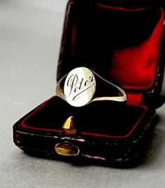 Vintage English 9k Gold Signet with engraved the name Peter. This ring is fully hallmarked. It was in Birmingham in 1970. On the back in engraved with the name Doreen. The face of the ring measures 12 by 10mm.  Weight: 3.65 grams Ring US size: 9.5  (it can be resized upon request)  Very good antique conditions. Thank you for visiting Boudoir Vintage!   Please feel free to contact me for further information or photos.  I offer international shipping. Your item will be packed with extreme care and will be shipped within 3-5 working days. If you are dissatisfied with your item, please feel free to contact me and would be happy to assist.  If you are interested in paying in installments or reserve an item, please send me an inquiry. To continue visiting my shop, please visit  https://www.etsy. Antique Signet Ring With Polished Finish For Formal Occasions, Classic Engraved Signet Ring, Luxury Formal Signet Ring Stamped 14k, Timeless Gold Signet Ring With Hallmarks, Heirloom 14k Gold Signet Ring For Formal Occasions, Formal Engraved Yellow Gold Signet Ring, Engraved Yellow Gold Signet Ring For Formal Occasions, Luxury 14k Stamped Signet Ring For Formal Occasions, Classic Hallmarked Signet Ring Collectible