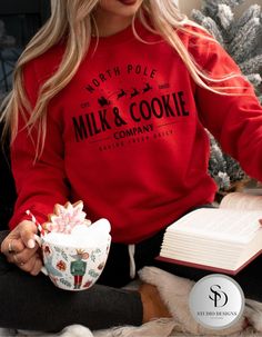 Snuggle up this holiday season with the cozy and festive Milk and Cookie Company crewneck sweatshirt. Featuring a vintage-inspired design, this sweatshirt is perfect for spreading Christmas cheer and enjoying the warmth of the season. Made from a soft, high-quality Gildan fabric, this crewneck offers both comfort and style, whether you're lounging by the fireplace or baking cookies. Ideal for gifting or adding to your holiday wardrobe, this sweatshirt brings a touch of nostalgia with its charming design. Material: Gildan cotton blend for ultimate comfort Fit: Unisex sizing, relaxed fit for a cozy feel Design: Milk & Cookie Company  Occasions: Perfect for casual outings, baking cookies, or as a thoughtful Christmas gift Gift Ideas: Ideal for baking cookies, casual outings, or those looking Simple Christmas Crewneck, Christmas Clothes Women, Christmas Sweatshirts Vinyl, Christmas Sweatshirt Ideas, Vintage Christmas Shirt, Christmas Crewneck Sweatshirt, Cookie Company, Cricut Christmas, Christmas Outfits Women