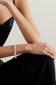 Mizuki's bracelet harnesses the timeless elegance of pearls in a completely modern way. It's crafted from 14-karat gold and strung with the lustrous gem in an array of sizes for added drama. Team yours with the coordinating necklace for a cohesive look. Elegant Pearl Bracelet For Party, Elegant Pearl Drop Bracelet For Party, Pearl Bracelet With Pearl Charm For Formal Occasions, Elegant Pearl Bracelets For Party, Elegant Hand-strung Pearl White Bracelet, Elegant Pearl White Bracelet For Party, Elegant Pearl White Bracelets For Party, Elegant White Gold Pearl Jubilee Bracelet, Formal Pearl Bracelet With Pearl Charm