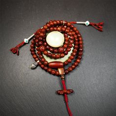 ❤This bodhi beads mala is made by Tibetan craftsmen and come from Hepo Town, Baiyu County, the birthplace of the famous Tibetan handicrafts,about 30 years old, hold and blessed by a lama in Baiyu Monastery.It is composed of 108 bodhi seed beads, and is equipped with 3 agate beads, silver bead counters are installed on both sides, 1 mani jewel bead clip,and finally consists a bone guru bead and vajra on the end, very elegant.❤Details1. Handmade 108 bodhi beads approximately 8mm,mala's perimeter i Handmade Spiritual Mala For Puja, Spiritual Rosary With Round Beads For Meditation, Spiritual Rosary For Meditation With Round Beads, Handmade Brown Necklace For Puja, Handmade Spiritual Mala For Rituals, 8mm Amber Beads For Spiritual Use, 8mm Amber Spiritual Beads, Traditional Handmade Mala For Meditation, Bohemian Mala With 8mm Beads For Blessing