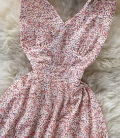 V-neck Mini Dress With Ditsy Floral Print For Vacation, Pink Floral Print V-neck Mini Dress, Elegant Floral Print V-neck Sundress, Flowy V-neck Sundress For Garden Party, V-neck Midi Dress With Ditsy Floral Print For Summer, Pink Floral Print V-neck Dress For Summer, Multicolor Floral Print V-neck Dress, Spring Floral Print V-neck Sundress, Chic V-neck Mini Dress With Ditsy Floral Print