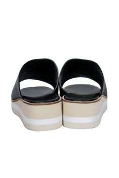 Slip on some easy and breezy summer style with these Vince sandals! The classic slide sandal is elevated (literally!) with a chic striped wedge and platform. Perfect for all your warm weather excursions! Whether you're headed to a post-beach dinner or going shopping downtown with your BFFs, pair these beauties with a maxi dress and your favorite sunnies and you'll be good to go! Size 9 Leather upper Slip on Open back Open toe Striped platform and wedge Leather sole and footbed w/ almost no wear Modern Slip-on Clogs For Summer, Comfortable Summer Slides With Wedge Heel, Open Toe Platform Slip-on Slides, Platform Slip-on Slide Sandals, Slip-on Platform Slide Sandals, Summer Platform Slide Slippers, Casual Slip-on Platform Slides, Summer Slip-on Synthetic Clogs, Summer Platform Open Toe Slides