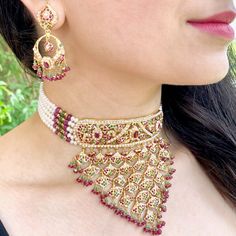 Featured is a traditional bridal choker set, ideally suited for bridal functions. The necklace weighs 69.2 gms including 19.68 gms in the hanging and stringing beads The earrings weigh 15.57 gms including 2.36 gms in the hanging ruby emerald beads. Price Breakup Summary Component Rupees % of Total 22k Gold 375,365 76.0% Stones & Beads 36,394 7.4% Making Charges 67,566 13.7% Taxes (GST) 14,380 3.0% Total 493,704 100.0% View Detailed Price Breakup Watch Video Here Jadau Choker, Bridal Choker Set, 22k Gold Jewelry Necklaces, Stringing Beads, 22k Gold Jewelry, Bridal Choker, Pearl Necklace Set, 22 Carat Gold, Emerald Bead