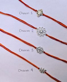 This listing is for one individual rakhi bracelet - add more than one to your cart for multiple bracelets or shop one of the pre-made bundles here: https://www.etsy.com/shop/TriyaDesigns?section_id=29470484 The ends of the rakhi bracelet are string. This string can be used to tie the rakhi. Each Rakhi is one size fits most - 11.5 inches. If you would like a different length, please request a custom order. Select Charm (See Pictures) Charm 1 Charm 2 Charm 3 Charm 4 Select Add-Ons None Mini Rakhi Orange Bracelet For Festivals As Gift, Orange Bracelets For Festivals Gift, Orange Bracelets As Festival Gifts, Orange Festival Bracelet As Gift, Handmade Orange Jewelry For Puja, Adjustable Orange Bracelets For Festivals, Traditional Silver Friendship Bracelets, Adjustable Orange Jewelry For Festivals, Adjustable Jewelry As Festival Gift