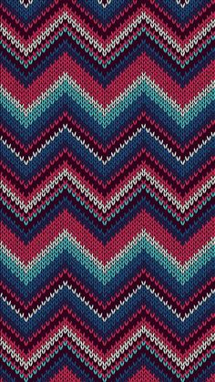 a knitted chevron pattern in blue, pink and purple