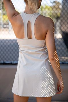 tennis dress, tank dress, double strap back design Summer Athleisure Dresses For Sports, Spring Tennis Activewear - Functional, Summer Athleisure Sports Dresses, Spring Functional Tennis Activewear, Functional Spring Tennis Activewear, Functional Fitted Tennis Skirt For Spring, Spring Fitted Go-dry Tennis Skirt, Spring Fitted Tennis Skirt With Go-dry Technology, Sporty Moisture-wicking Summer Dresses