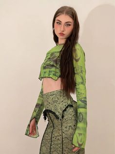 𝔇𝔢𝔱𝔞𝔦𝔩𝔰: Style: Fairy Grunge, Streetwear, Y2K Material: Spandex (Stretchable) This mesh top features a graffiti pattern and split sleeves, which can be your inspiration for making a grunge fairy look. With its stretchy fabric, this top can perfectly fit your body. Get free shipping with a purchase of over 80 $ at our store Model wears s with 5'5, 110 lbs SIZE LENGTH BUST SLEEVES 27 in 26-35 in 15 inM 28 in 28-36 in 16 inL 28 in 30-38 in 16 inItem measured by hands may have 1-2 in differen Fitted Mesh Tops In Grunge Style, Fairy Grunge Long Sleeve Top For Party, Fairy Grunge Long Sleeve Party Top, Fairy Grunge Tops For Spring Party, Fitted Fairy Grunge Top, Fitted Fairy Grunge Top For Alternative Fashion, Spring Fairy Grunge Party Tops, Y2k Party Mesh Top, Fairycore Tops For Spring Party