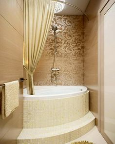 a bathroom with a round tub and curtained shower