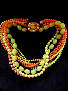 Vintage 60's Coral YELLOW lucite Bead multi strand Flower enamel clasp NECKLACE  -- Art. 138/2 - by RAKcreations on Etsy https://www.etsy.com/listing/231911878/vintage-60s-coral-yellow-lucite-bead Vintage Yellow Necklace With Colorful Beads, Handmade Vibrant Yellow Necklace, Yellow Multi-strand Jewelry With Polished Beads, Vintage Lampshades, Vintage Orange Large Beads, Bakelite Jewelry, Vintage Yellow Polished Beads, Necklace Art, Clasp Necklace