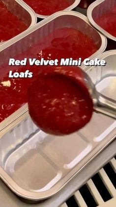 red velvet mini cake loafs being scooped with a spatula