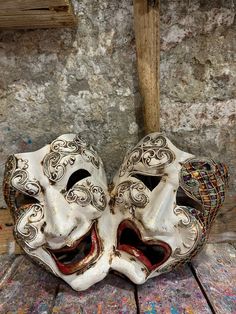 Tragi-comic ornament mask, hand-decorated in Venice with friezes, glitter and various decorations. -Made in Italy hypoallergenic and non-toxic material/resin. -Dimensions/25x30 Unisex -Shipping/worldwide We ask you to leave your email or telephone number to provide you with the shipping tracking code after purchasing. Theatre Masks Aesthetic, Hand Painted Masks And Prosthetics For Carnival, Hand Painted Carnival Masks, Artistic White Masks For Festivals, Artistic Hand Painted Masks For Carnival, Artistic Hand Painted Masks And Prosthetics For Carnival, Artistic Hand-painted Masks For Carnival, Artistic Masks For Mardi Gras Theater, Artistic Masks And Prosthetics For Carnival Theater