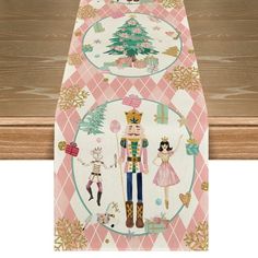 a pink and white table runner with nutcrackers on it