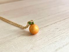 This dainty orange / tangerine necklace is made of the following: (1) Gold plated orange slice charm (charm size: 12 x 8.5mm) (2) Gold plated or 14KGF chain and findings ✏️ Please choose the length of the chain (the length includes clasp and findings) ✏️ Please choose your desired plating of chain ❣️ If you are unsure about which length to choose , please leave me a note to request an extension chain to be added to the chain at check out. 🍊EARRINGS 🍊 Threader -> https://www.etsy.com/listing Delicate Peach Jewelry For Gifts, Adjustable Peach Jewelry For Gifts, Peach Necklace Gift, Peach Round Necklace For Gift, Peach Round Necklace Gift, Round Peach Necklace For Gift, Gift Round Peach Necklace, Orange Pendant Charm Necklaces For Gifts, Adjustable Round Orange Necklace