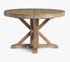 a round wooden table with four legs