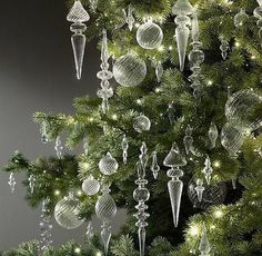 a christmas tree with ornaments hanging from it