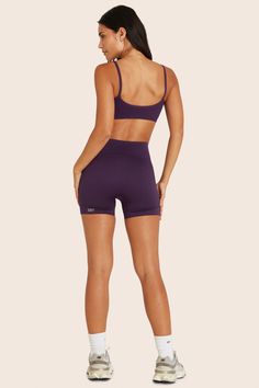 The Sculptflex® Bike Shorts in Fig feature a high-waisted design and ribbed detailing. Seamless for a smooth fit, made from our Sculptflex® fabric for a supportive and flexible workout experience. Solid Nylon Biker Shorts For Sportswear, Solid Color Nylon Biker Shorts For Sportswear, Mid-thigh Length Elastane Sportswear Activewear, Sporty Seamless Nylon Bottoms, Compressive High Waist Breathable Biker Shorts, Seamless High Waist Biker Shorts, Sports Biker Shorts Elastane, Solid Elastane Biker Shorts For Training, High Waist Solid Seamless Biker Shorts