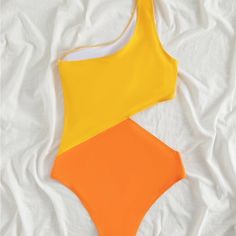 Cool, Bright Color Block Swimsuit. Never Worn. Yellow One Piece Swimwear For Beach, Yellow Beachwear One Piece For Swimming, Yellow Beachwear One-pieces For Swimming, Yellow One-piece Beachwear For Swimming, Yellow Beachwear One Piece For Poolside, Yellow Beachwear One-piece For Poolside, Casual Color Block Bodysuit For Summer, Trendy Yellow One-piece Bodysuit, Yellow Beachwear Bodysuit For Swimming