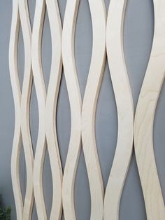 the wood is cut into wavy shapes