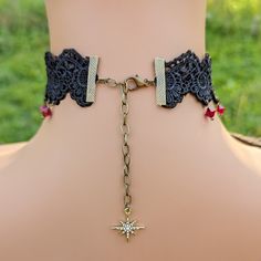 This vintage gothic styled crystal choker necklace features captivating Siam Red Swarovski crystals with nice crisp facets and brass embellishments. The detailed stampings have been in production since the 1940's and the vintage 16x11mm focal crystal is no longer in production, making this necklace a rare find. The lace is double-layered and hand sewn together for extra durability. Both elegant and stylish, this piece would be perfect for any formal occasion. Swarovski Crystals are made in Austr Red Choker Necklace, Red Choker, Lace Choker Necklace, Crystal Lace, Lace Choker, Crystal Choker Necklace, Vintage Gothic, Crystal Choker, Hair Accessories Jewelry