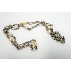 A beautiful and substantial vintage David Yurman 'Figaro' necklace, circa early-21st century. Necklace is comprised of substantial sterling silver links and large freshwater pearls embraced by 18-karat yellow gold accent beads, with marker's mark, D.Y., and '925' for sterling silver, at toggle clasp. Necklace is versatile and can be worn long or doubled-up. Necklace was purchased at the David Yurman store, Madison Avenue, New York. Very good condition as shown in images. No issues. Necklace meas Luxury Metal Chain Necklace With Pearl Chain, Luxury Pearl Chain Metal Necklace, Luxury Metal Pearl Chain Necklace, Luxury Pearl Necklace With Metal Chain, Formal Metal Jewelry With Pearl Chain, Luxury Metal Necklace With Pearl Chain, Antique Pearl Chain Jewelry For Formal Occasions, Antique Pearl Chain Necklace For Formal Occasions, Luxury Formal Pearl Necklace With Chain