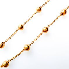 Dress up your ensemble with this exquisite chain bracelet beautiful crafted in Italy. 14K Yellow Gold3mm Beads 7” Lobster clasp Gold Beaded Chain Bracelet In 14k Gold Filled, Formal Jewelry With Round Beads Chain, Elegant Gold Plated Necklaces With Ball Chain, Gold Beaded Chain Rosary Bracelet With Round Beads, Gold Rosary Bracelet With Beaded Chain, Elegant Ball Chain Necklace For Jewelry Making, Elegant Beaded Link Chain Necklace, Elegant Ball Chain Bracelet, Elegant Beaded Chain Link Necklace