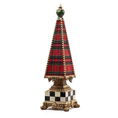 a red and black tartan lamp on a white background