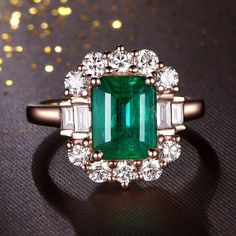 Jewelry details:Center Stone:3.55ct lab Created EmeraldColor:Green--5AClarity:VVSCut:Heart Cut / 3EXSide Stone: Simulated DiamondColor:D-FClarity:VVS1Matal Type: 14K Rose Gold / 14K White Gold / 14K YellowSKU: HSW-ZM006Purchase Guarantee:1: Provide you with the best service.2: 14 Day Refund Guarantee.3: Free Gift Box&Packing4: Free Shipping and insurance to All Parts Of The World.Accessories:-Certificates of ring and beautiful Ring box, and little gifts.Processing time:When we receive paymen Gia Certified Rose Gold Cubic Zirconia Rings, Rose Gold Baguette Cut Ring With Center Stone, Gia Certified Rose Gold Wedding Diamond Ring, Emerald Cut Diamond Emerald Ring In Rose Gold, Rose Gold Emerald Ring With Diamond, Rose Gold Emerald Ring With Brilliant Cut, Luxury Rose Gold Emerald Ring For Wedding, Rose Gold Emerald Ring With Brilliant Cut For Wedding, Rose Gold Brilliant Cut Emerald Wedding Ring