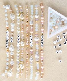 April Soderstrom - Not Your Nana's Pearls - Name Game Bracelet Kit Gold Pearl Beaded Bracelets With Letter Beads, Mother's Day Beaded Pearl Jewelry, Personalized Gold Pearl Beaded Bracelets, Gold Beaded Bracelets With Pearl And Gemstone Beads, Adjustable Pearl Beaded Necklace With Spacer Beads, Gold Beaded Necklaces With Letter And Round Beads, Gold Beaded Necklaces With Letter Beads, Elegant Beaded Bracelets With Letter Beads For Jewelry Making, Adjustable Pearl Beaded Necklace With Faceted Beads