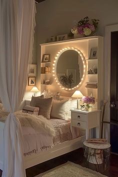 a white bed sitting under a round mirror