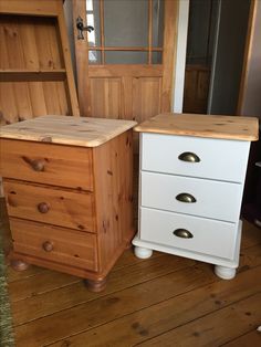 a white dresser sitting on top of a wooden floor