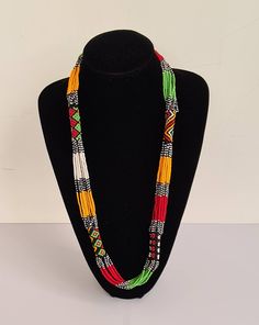 This necklace is 100% handcrafted using colorful fine beads. **Listing is for 2 necklaces like shown above. They make a perfect gift to loved ones. Dimensions; 32 inches. **Buy multiple items and pay shipping for 1 item only.The rest ships free. Custom orders are welcome. More neckleces here; https://www.etsy.com/shop/TribalTess?ref=seller-platform-mcnav&section_id=21306083 Back to my shop; https://www.etsy.com/shop/TribalTess?ref=seller-platform-mcnav Colorful Adjustable Beaded Necklaces With Polished Beads, Handmade Multicolor Necklace For Festive Occasions, Colorful Adjustable Beaded Necklace With Polished Beads, Festive Long Beaded Necklace With Colorful Beads, Festive Necklaces With Tiny Round Beads, Festive Multicolor Round Beads Necklaces, Beaded Necklaces For Festivals As Gifts, Beaded Necklaces For Festivals And Gifts, Long Beaded Necklaces For Festivals