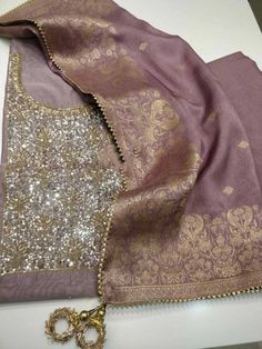 Item Overview ATHARVA Hand Embroidery Indian Salwar Kameez/Sequence Work Chanderi Silk/Lilac/Banarsi Silk Dupatta/Custom Stitch/Churridar/Plazzo/Custom Anarkali/Gift Dno. CH1536 Fabric: * Shirt Chanderi Silk - Dark Lilac- 2.5 Mts Hand Embroidered Neck. * Dupatta: Banarsi Silk Dupatta- 2.5 Mts Motifs May wary from pictures * Bottom Santoon Silk 2.5 Mts. Excusive Hand Embroidered Party Wear Punjabi Suit. 🌷CUSTOMIZATION (No Extra Charges) * Fabrics Customization: Designs Can be made in different F Hand Embroidery Indian, Patiala Salwar Kameez, Embroidery Indian, Embroidered Salwar, Sequence Embroidery, Indian Salwar, Indian Salwar Kameez, Patiala Salwar, Embroidered Pants