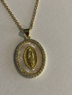 Gold Plated Nuestra Señora de Guadalupe. Virgen. Pendant Necklace w/ Pearl Inlay | eBay Gold Virgencita Necklace, Hispanic Jewelry, Virgencita Necklace, Pearl Inlay, Catholic Jewelry, Christmas Wishlist, Oval Shape, Everyday Look, Gold Jewelry