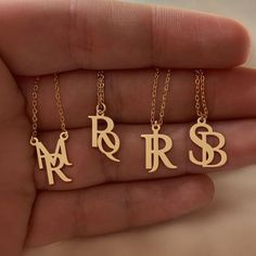 Personalize Your Style with Our Logo Name Necklace. Crafted with precision and attention to detail, this necklace is the perfect way to showcase your personal style. Metal: Stainless Steel Available in a variety of finishes: 🌹 Rose Gold 🟡 18k Gold 🥈 Silver The chain length options include: - 16" - 18" - 20" - 22" Each necklace is meticulously: ✨ Designed ✨ Polished ✨ Assembled Please note: All our items come with a 5 cm/2" extension chain. so don't hesitate about the size!! * 14" NECKLACE: Fits most like a choker * 16" NECKLACE: Falls perfectly around the base of the neck like a collar. On a petite woman it will hit your collarbone while for plus size women it might feel more like a choker. * 18" NECKLACE: A common choice for women that will fall just below the throat at the collarbone. Elegant Metal Initial Pendant Necklace, Gold Metal Initial Pendant Necklace, Gold Metal Pendant Initial Necklace, Vintage Personalized Gold Plated Necklace, Personalized Vintage Gold Plated Necklace, Personalized Vintage Gold-plated Necklace, Personalized Gold Initial Necklace In Metal, Gold Monogram Initial Necklace For Formal Occasions, Gold Monogram Initial Necklace For Formal Events