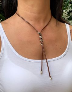 This beautiful leather necklace is handmade to order by me using  real leather cord- 3mm, antique silver plated zamak elements and silver plated zamak clasp. The necklace in the photo is 17"/43 cm.  📌CARE INSTRUCTIONS:  - Leather jewellery should **NOT** come in contact with water. Please take this into consideration when taking a shower, swimming etc. This is important to keep the leather cord in good condition for as long as possible. - Please avoid contact with strong perfumes, lotions, crea Silver Leather Necklace With Adjustable Cord, Handmade Leather Lariat Jewelry, Elegant Leather Necklace For Everyday Use, Elegant Leather Necklace For Everyday, Handmade Leather Silver Jewelry, Handmade Silver Leather Jewelry, Silver Snake Necklace, Necklace Leather Cord, Leather Cord Jewelry