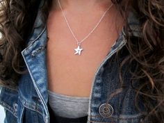 "This tiny adorable star has a heart in the center. For the star-gazers and the dreamers. Only 1/2\" square and made from sterling silver it is reversible, wear either side. Choose your chain style and length from the drop down menu. For the smaller version: https://www.etsy.com/listing/225888118/sterling-silver-star-on-a-string For the matching earrings: https://www.etsy.com/listing/225890145/little-star-earrings-sterling-silver Mother-Daughter Set: https://www.etsy.com/listing/225891123/sterli Everyday Personalized Star-shaped Jewelry, Star-shaped Charm Necklaces For Gifts, Sterling Silver Starfish Charm Necklace, Everyday Star Charm Jewelry, Nickel-free Sterling Silver Star Charm Necklace, Sterling Silver Star Charm Necklace Nickel Free, Personalized Sterling Silver Star Charm Necklace, Silver Star Charm Necklace, Tiny Star-shaped Sterling Silver Jewelry