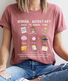 Kick off the school year with our School Secretary Shirt, featuring a fun and playful design perfect for the office. This Funny Back To School Tshirt is a Cute T-shirt Gift for School Secretary, combining humor and comfort. Ideal for any school receptionist, this Admin Squad Tee shows appreciation for their hard work and dedication. Product Description: ⇝ Bella and Canvas Brand Shirts ⇝ Unisex Adult Sizing ⇝ Rolled Sleeves in pictures are for styling purposes only ⇝ Props used in photos for are Secretary Shirts School, School Secretary Outfits, School Secretary Office, Secretary Outfits, School Secretary, Diy Shirts, Brand Shirts, Rolled Sleeves, Work Style