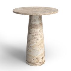 a round marble table on a white background