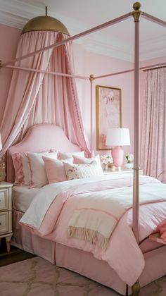 a pink bedroom with four poster bed and curtains on the window sill, along with two nightstands