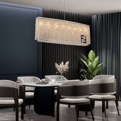 a dining room table with chairs and a chandelier